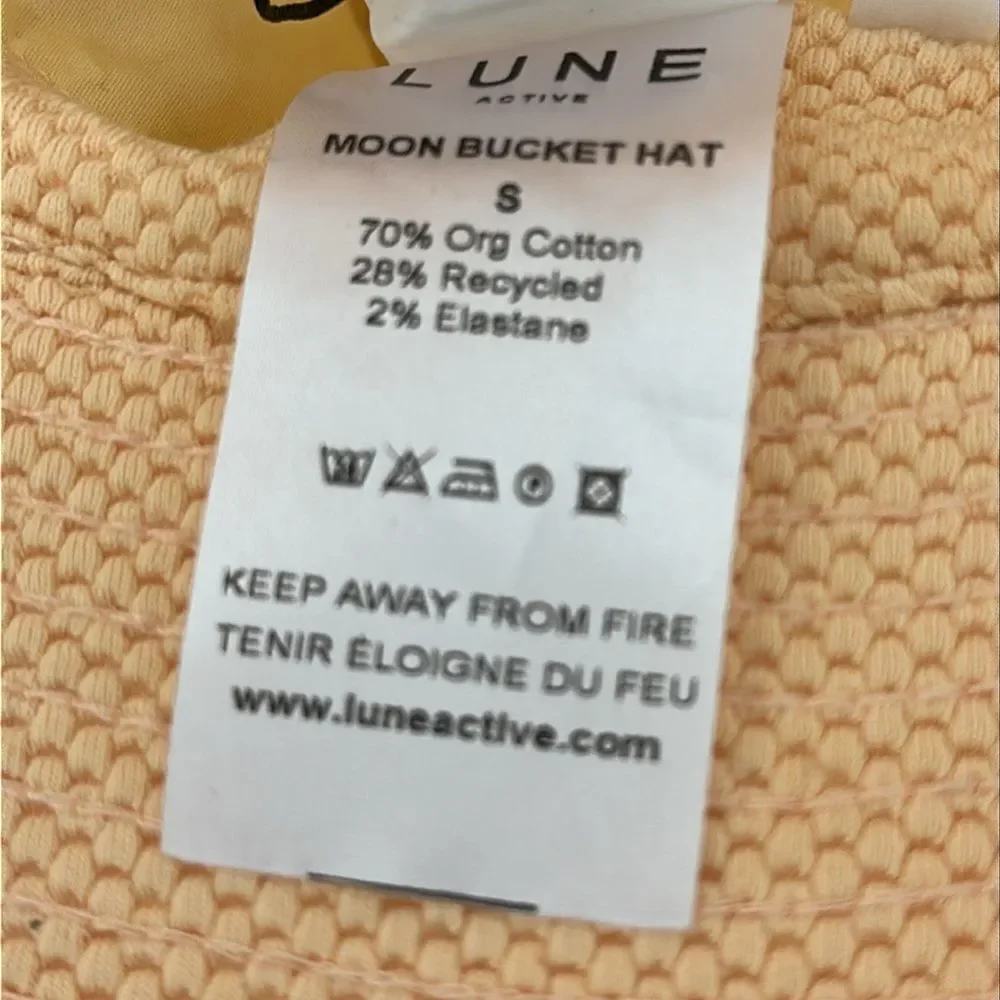 Lune Active Moon Bucket Hat – Almond Cream/Peach (Small)
